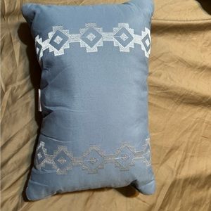NWOT throw pillow. Muted blue color w/ silver embroidery